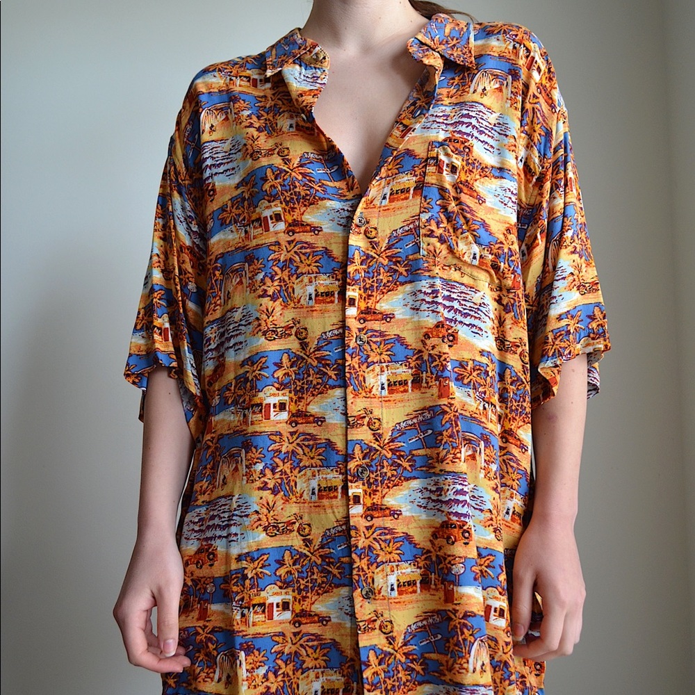 orange and blue hawaiian style button down shirt by junction west
100% rayon XL